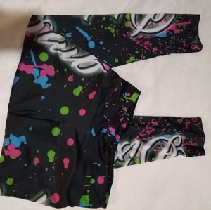 Women's spandex leggings size S-M colorful. Wording "Dixie Club"